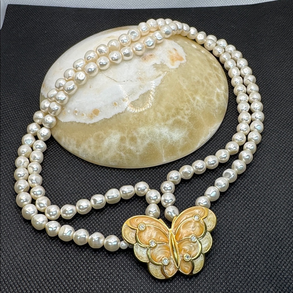Vintage KJL for Avon faux pearl necklace with enamel crystal butterfly pendant.
